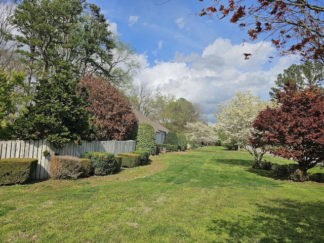 view of yard featuring fence