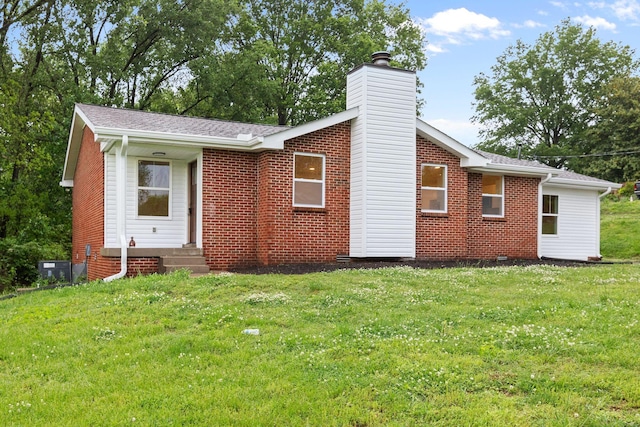 846 Forrest Glen Dr, Old Hickory, TN 37138 - view of front facade featuring a front yard, a chimney, brick siding, a shingled roof, and entry steps