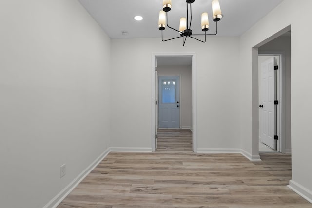 846 Forrest Glen Dr, Old Hickory, TN 37138 - unfurnished dining area with light wood-style floors, baseboards, and a chandelier
