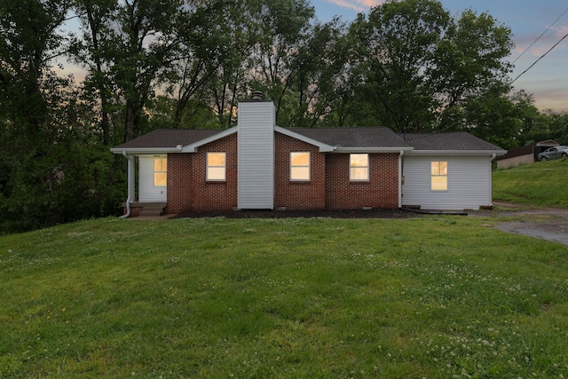 846 Forrest Glen Dr, Old Hickory, TN 37138 - view of front of home with brick siding, a front lawn, and a chimney