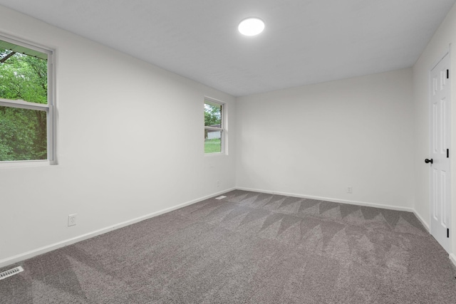 846 Forrest Glen Dr, Old Hickory, TN 37138 - spare room featuring baseboards, visible vents, a wealth of natural light, and carpet