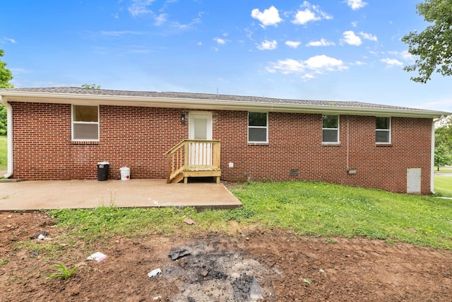 846 Forrest Glen Dr, Old Hickory, TN 37138 - rear view of house with brick siding, a patio area, and a lawn