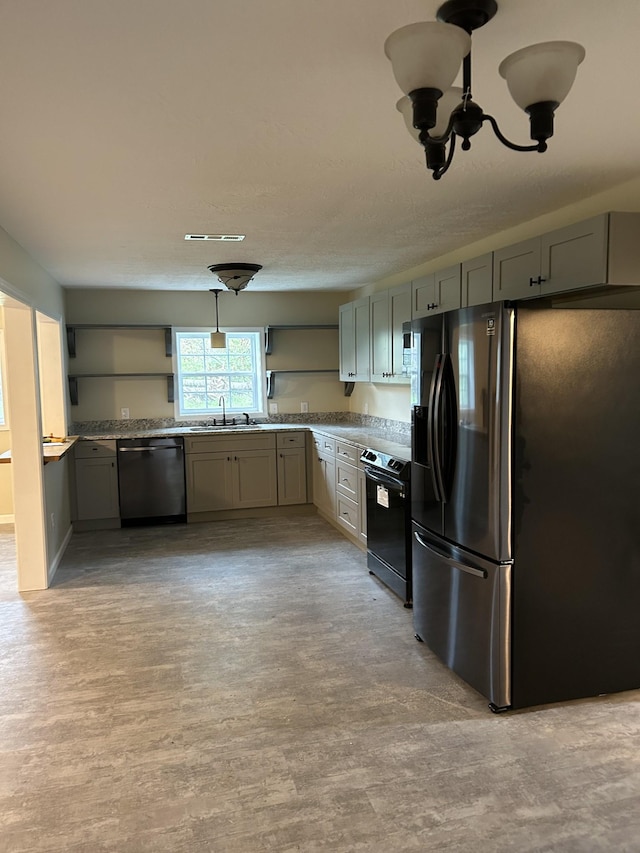 kitchen with visible vents, open shelves, a sink, black appliances, and gray cabinetry