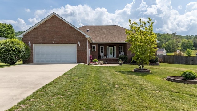 2231 Shelby Dr, Cookeville, TN 38506 - single story home featuring a garage, brick siding, fence, a front lawn, and concrete driveway