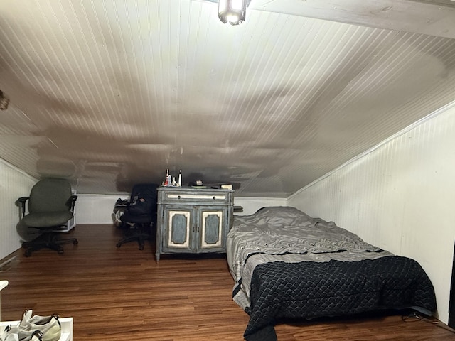 bedroom with wood finished floors