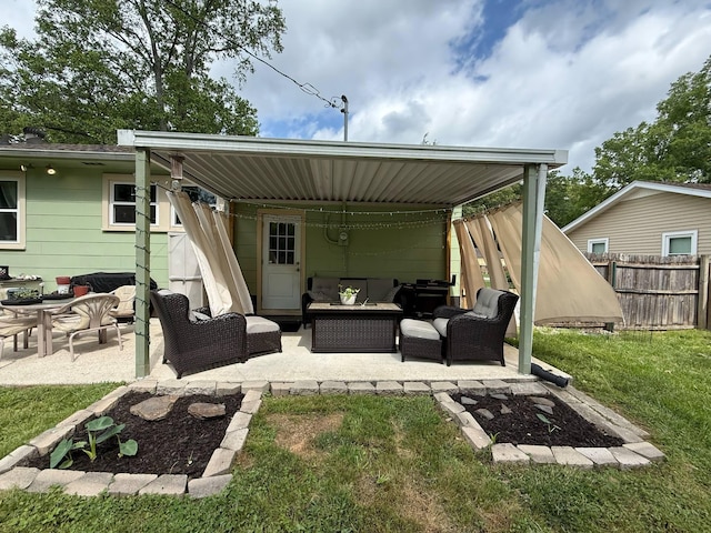 view of patio / terrace with outdoor lounge area and fence