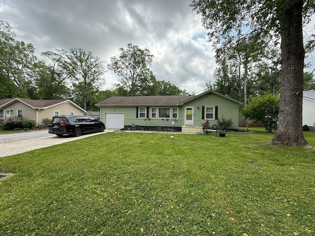 ranch-style home with concrete driveway, a front yard, and a garage