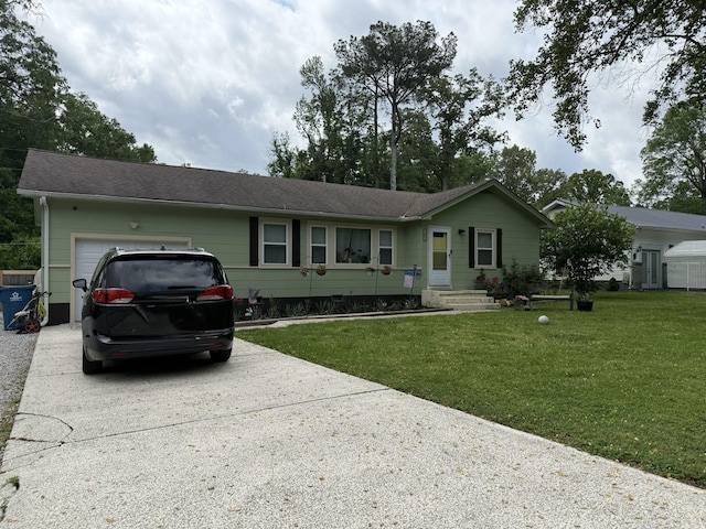 ranch-style home with concrete driveway, a front lawn, roof with shingles, and a garage