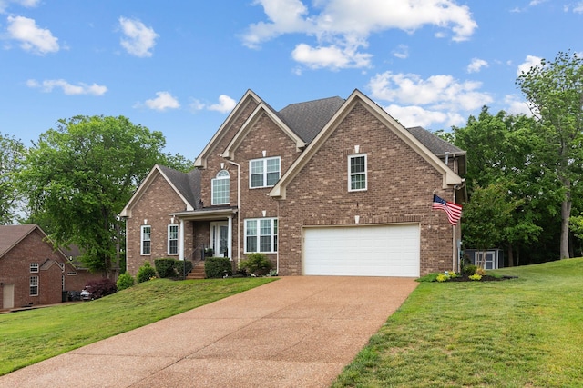 traditional home featuring concrete driveway, brick siding, and a garage