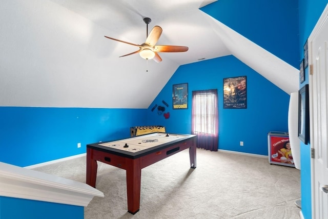 rec room featuring carpet floors, ceiling fan, vaulted ceiling, and baseboards