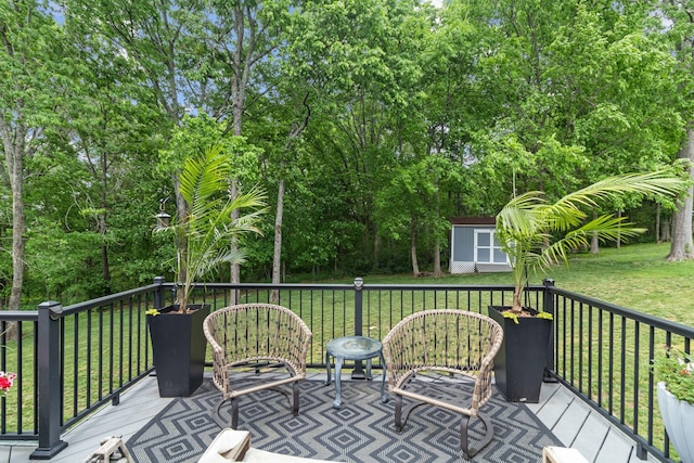 deck with a yard, a shed, and an outdoor structure