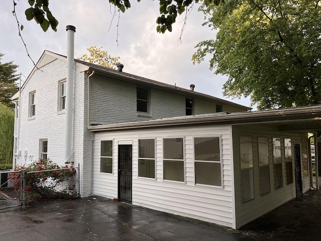 361 Binkley Dr, Nashville, TN 37211 - rear view of house featuring a patio, brick siding, and a gate