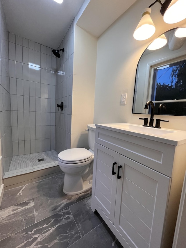 361 Binkley Dr, Nashville, TN 37211 - full bath with marble look tile flooring, vanity, a shower stall, and toilet