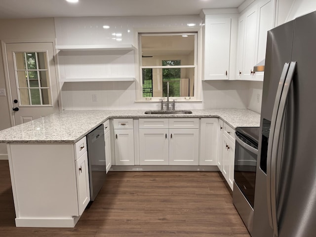 361 Binkley Dr, Nashville, TN 37211 - kitchen featuring appliances with stainless steel finishes, open shelves, a sink, dark wood-type flooring, and white cabinetry