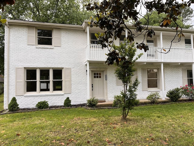 361 Binkley Dr, Nashville, TN 37211 - view of front of home with a balcony, a front lawn, and brick siding