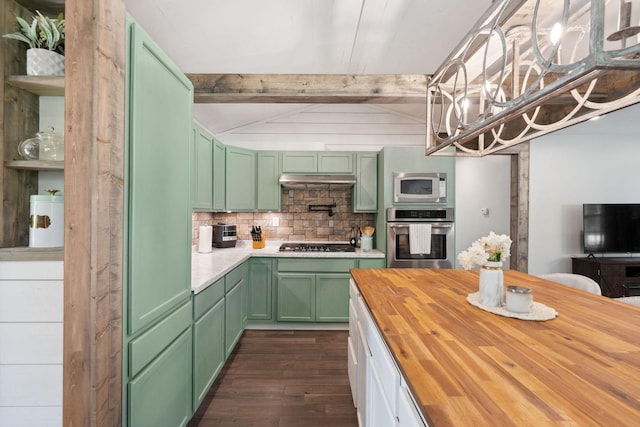 kitchen featuring dark wood-style flooring, tasteful backsplash, wood counters, green cabinetry, and stainless steel appliances