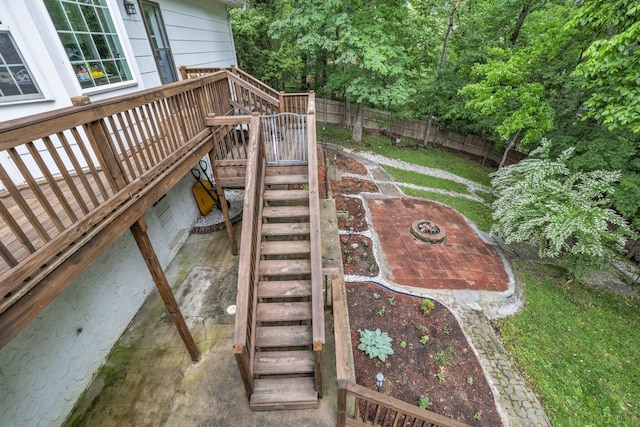 1204 Wood Pines Ln, Hixson, TN 37343 - view of play area featuring stairs, fence, and a deck