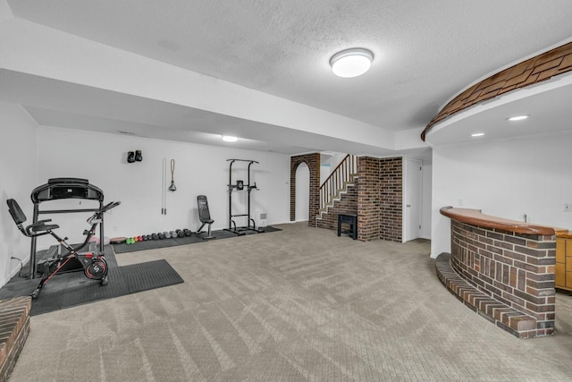 1204 Wood Pines Ln, Hixson, TN 37343 - workout area featuring carpet flooring, a textured ceiling, and bar
