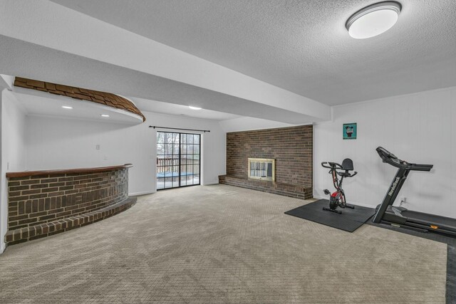 1204 Wood Pines Ln, Hixson, TN 37343 - workout area featuring a dry bar, a brick fireplace, carpet, and a textured ceiling