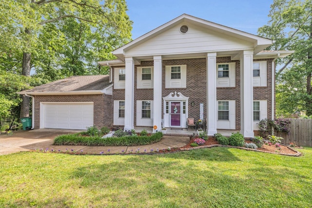 1204 Wood Pines Ln, Hixson, TN 37343 - neoclassical home featuring brick siding, a garage, driveway, and covered porch
