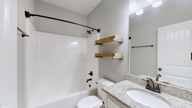 bathroom featuring shower / bathing tub combination, vanity, and toilet