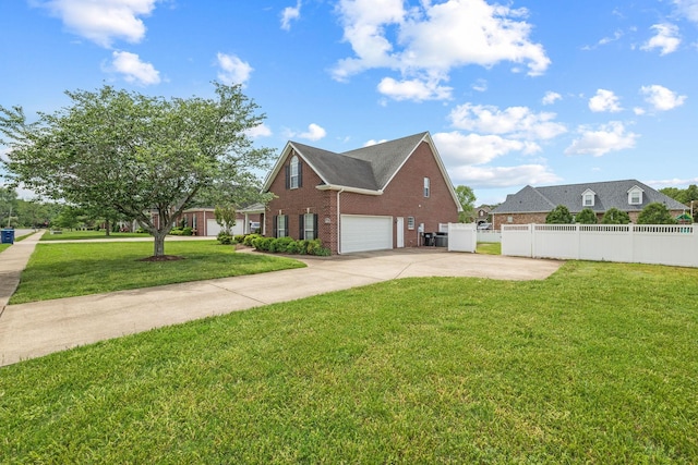 view of side of property featuring fence, brick siding, concrete driveway, an attached garage, and a yard