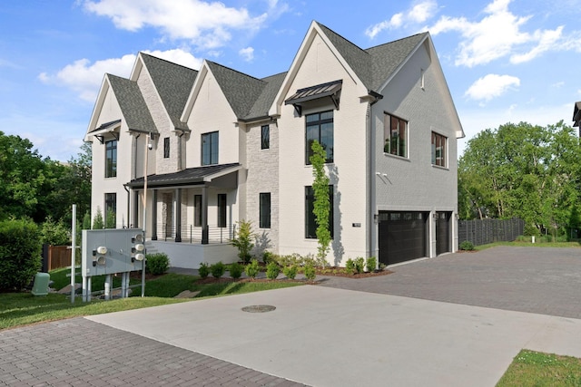 view of home's exterior with an attached garage, decorative driveway, and brick siding