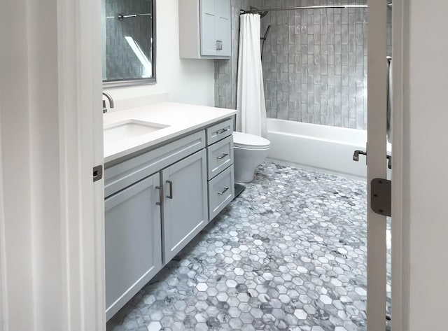 full bath featuring vanity, toilet, and shower / tub combo with curtain