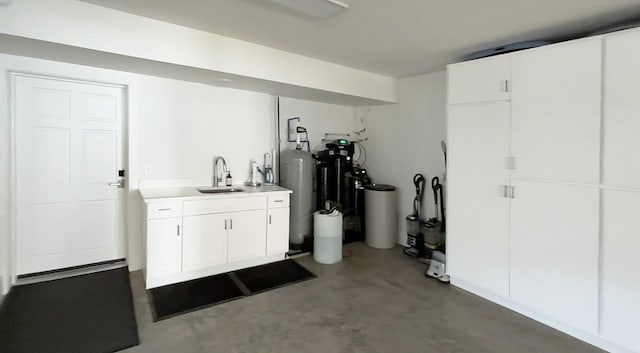 interior space featuring a sink and concrete floors