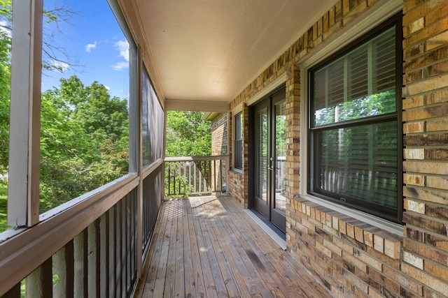 wooden deck featuring covered porch