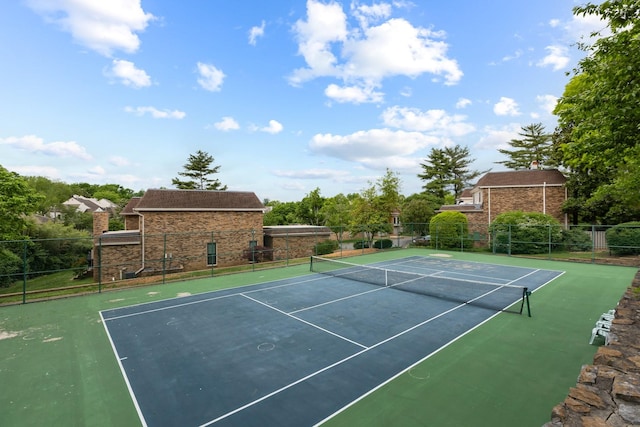 view of sport court with community basketball court and fence