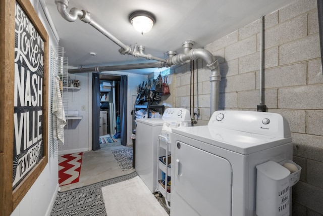 716 S Summerfield Dr, Madison, TN 37115 - washroom with washer and clothes dryer, concrete block wall, and baseboards