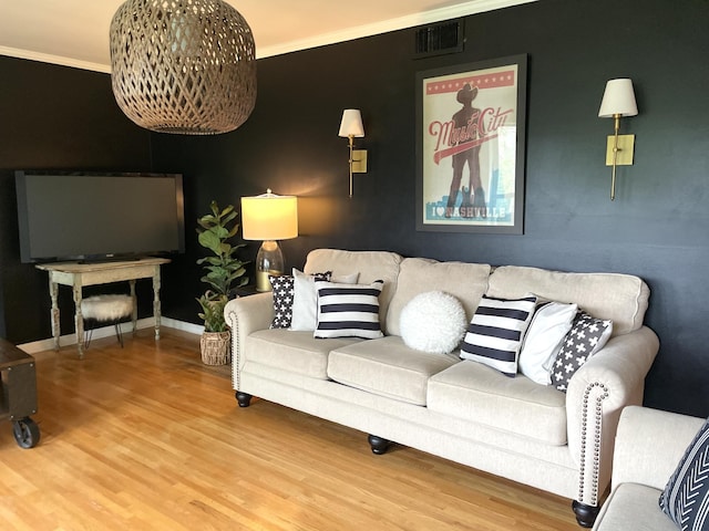 716 S Summerfield Dr, Madison, TN 37115 - living area with wood finished floors, crown molding, and baseboards