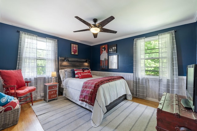 716 S Summerfield Dr, Madison, TN 37115 - bedroom featuring wood finished floors, ornamental molding, a wainscoted wall, and ceiling fan