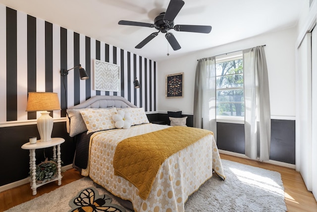 716 S Summerfield Dr, Madison, TN 37115 - bedroom featuring wood finished floors, a closet, baseboards, ceiling fan, and wallpapered walls
