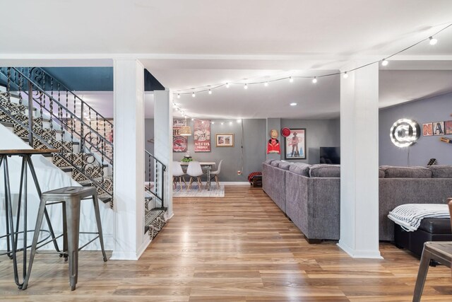 716 S Summerfield Dr, Madison, TN 37115 - living room featuring wood finished floors, stairway, and baseboards