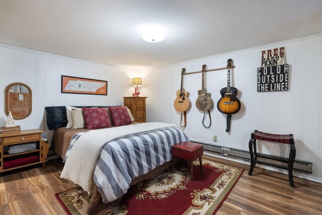 716 S Summerfield Dr, Madison, TN 37115 - bedroom with baseboard heating and wood finished floors