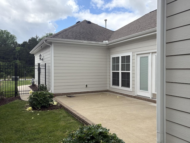 view of patio / terrace featuring fence