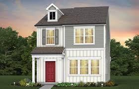 view of front of property featuring board and batten siding and a front yard