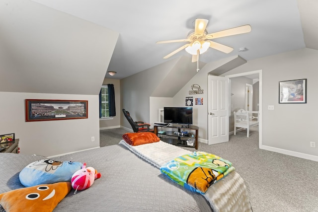 carpeted bedroom featuring baseboards, ceiling fan, and lofted ceiling