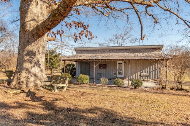 view of front of home with a porch and board and batten siding