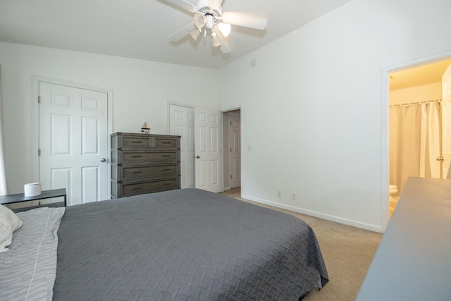 bedroom with light colored carpet, a ceiling fan, and baseboards