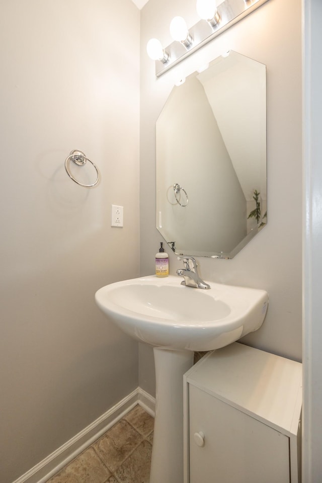 bathroom featuring baseboards