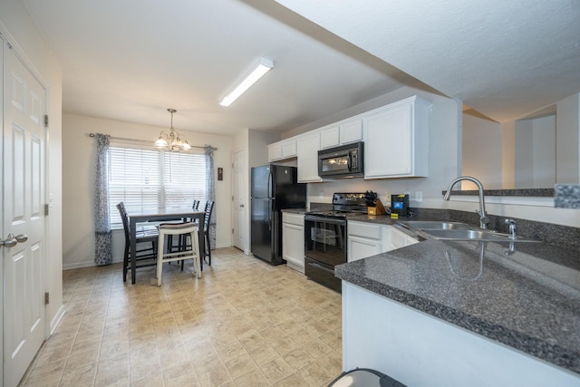 kitchen featuring an inviting chandelier, a sink, white cabinetry, baseboards, and black appliances
