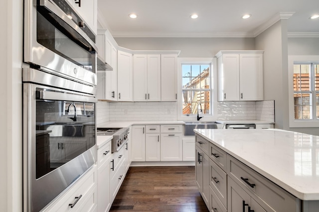 2509B Scovel St, Nashville, TN 37208 - kitchen with crown molding, recessed lighting, appliances with stainless steel finishes, and a healthy amount of sunlight