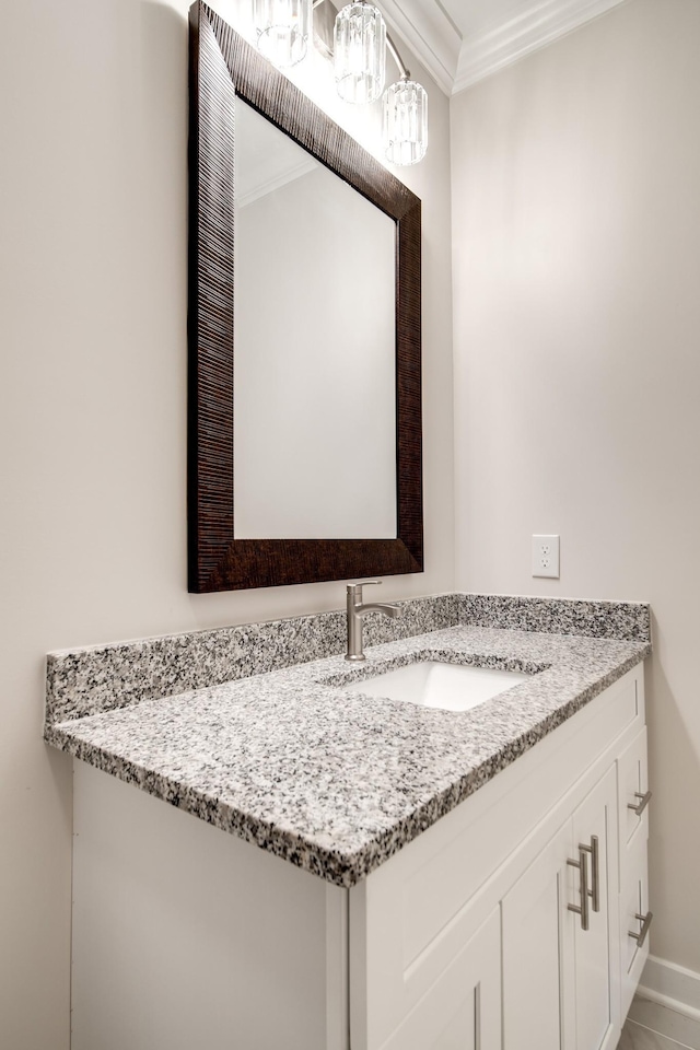 2509B Scovel St, Nashville, TN 37208 - bathroom with vanity, ornamental molding, and a notable chandelier