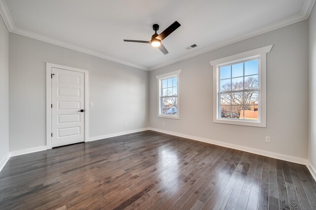 2509A Scovel St, Nashville, TN 37208 - spare room with crown molding, visible vents, baseboards, ceiling fan, and dark wood-type flooring