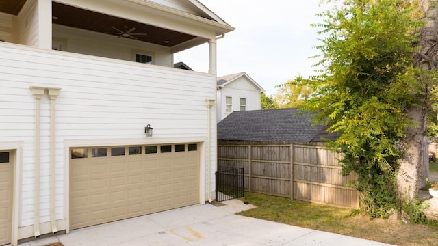 2509A Scovel St, Nashville, TN 37208 - garage with a ceiling fan, fence, and driveway