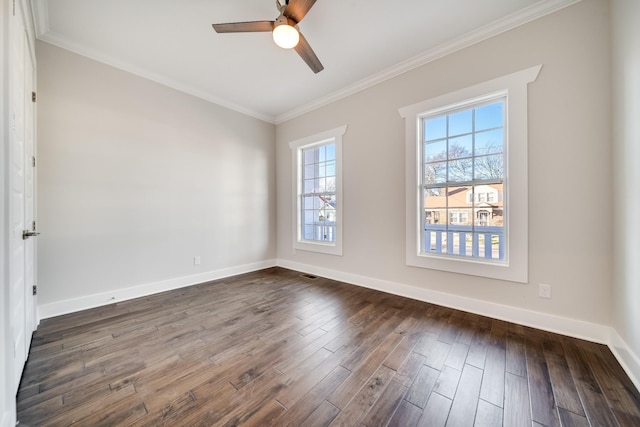 2509A Scovel St, Nashville, TN 37208 - empty room featuring crown molding, visible vents, dark wood-style flooring, baseboards, and a ceiling fan