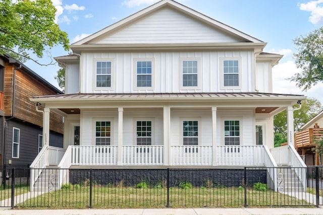 2509A Scovel St, Nashville, TN 37208 - view of front of home with stairs, a fenced front yard, covered porch, and a standing seam roof